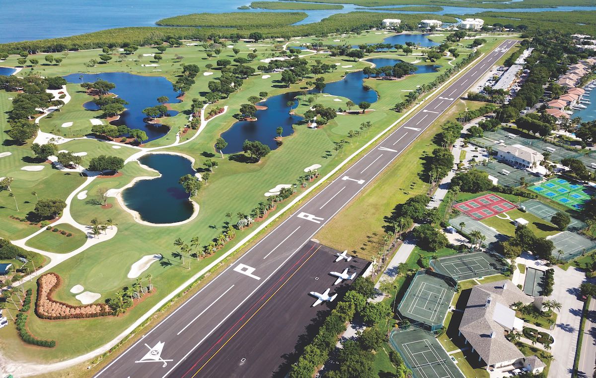 Ocean Reef Club private airport runway alongside championship golf course